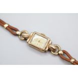 Regalis Andrew Ladies 9ct Gold wristwatch on Leather strap