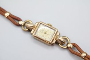 Regalis Andrew Ladies 9ct Gold wristwatch on Leather strap