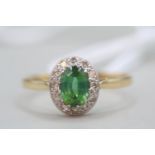 Ladies 18ct Gold Oval Spinel set Diamond cluster ring Size W. 3.3g total weight