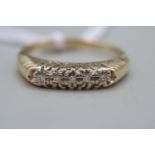 14k Ladies Gold Diamond set ring Size W. 3.50g total weight