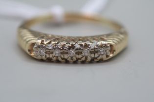 14k Ladies Gold Diamond set ring Size W. 3.50g total weight
