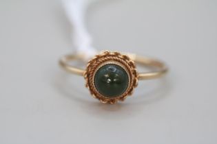 Ladies 9ct Jade set rub over ring 1982 Size O. 1.8g total weight