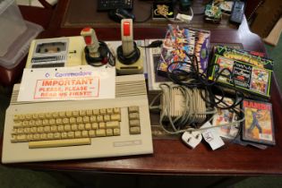 Vintage Commodore 64 with various games and accessories
