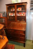 Glazed bureau bookcase of 4 drawers with fitted interior