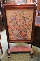 Good quality 19thC Rosewood fire screen on scroll supported feet