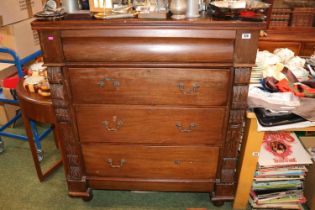 Victorian Mahogany Chest of 4 drawers with metal drop handles and carved supports