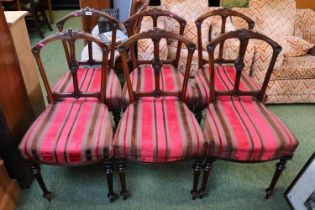 Set of 6 Walnut framed carved back dining chair with upholstered stripped seats over fluted legs