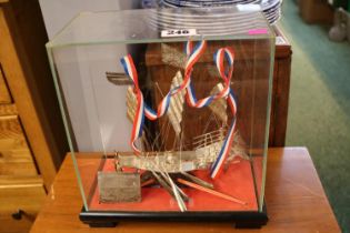 Silver model of a Chinese Boat with presentation to Capt R Priestley 1979 - 1982 under glass case