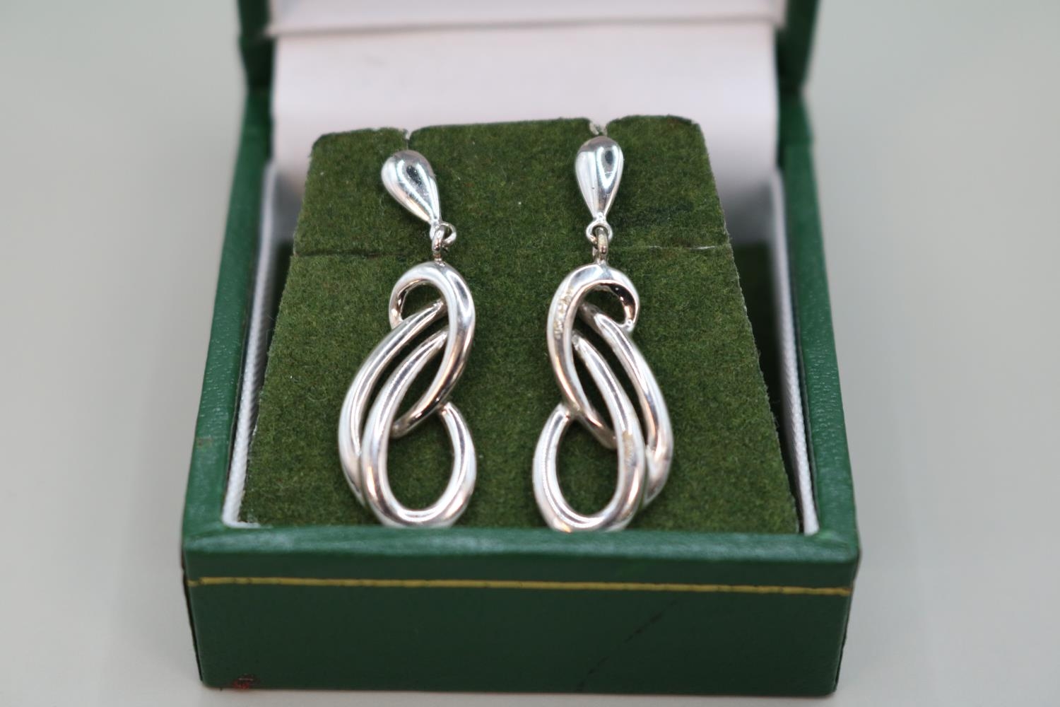 Pair of Good Quality 9ct White Gold Scroll earrings