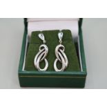 Pair of Good Quality 9ct White Gold Scroll earrings