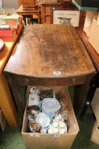 Regency Drop Leaf table with single drawer over tapering legs and brass casters