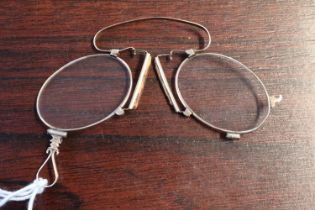 Pair of Yellow metal Pince Nez with oval lenses