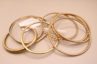 Collection of Gold Plated and Yellow metal Bangles