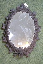 Victorian Coalbrookdale Cast Iron Oval Ivy decorated wall mirror with date lozenge 50cm in Height