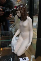 Royal Dux figure of a Nude crouching with Cat marked to base 23cm in Height