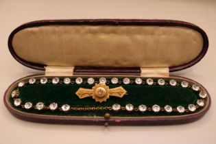 Edwardian 9ct Gold Diamond set Bar brooch 2.6g total weight and a Edwardian Paste set Necklace