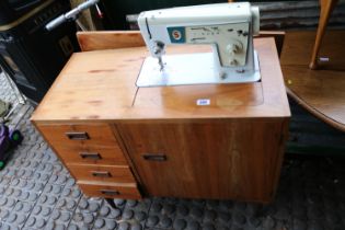 Walnut cased Singer Sewing machine