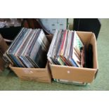 2 Boxes of assorted Vinyl Records to include Genesis, Bob Dylan, ABBA etc
