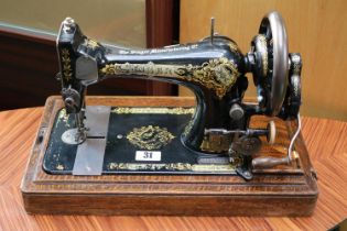 Singer Sewing machine in oak case F1447694