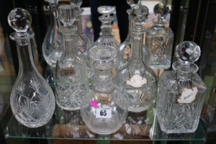 Collection of Edwardian and later Crustal Decanters with Silver Brandy Sherry Labels