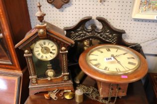 Walnut cased circular Roman numeral wall clock and a Victorian Mantel clock