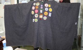 Scouting Poncho with assorted Badges and Embroidered emblems