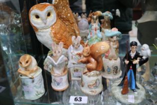 Collection of 5 Royal Worcester Peter Rabbit 100 Year Candle snuffers, Beswick Barn Owl and a