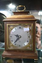 An Elliott Mantel clock with Silvered Dial retailed by Stanley Hunt of Gainsborough