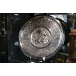 After Léonard Morel-Ladeuil (1820-1888). An Elkington & Co silver plated circular charger, decorated