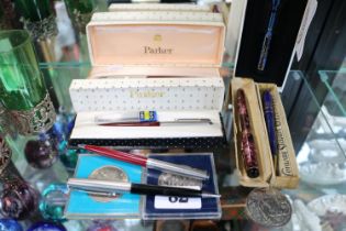 Collection of assorted Pens to include Conway Stewart, Parker etc and 2 Cased collectors coins
