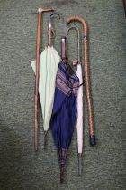 Collection of Vintage Umbrellas and Canes with with silver collars