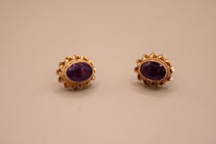 Pair of 9ct Gold Rub over Oval Amethyst set earrings