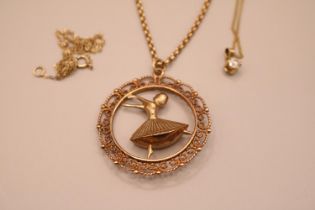 9ct Gold Pendant in the form of a Dancing Lady and a qty. of 9ct gold chains 10.9g total weight