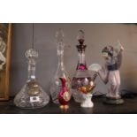 Collection of Crystal Decanters, 2 Silver Decanter labels, Lladro Geisha etc