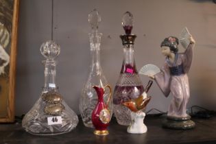 Collection of Crystal Decanters, 2 Silver Decanter labels, Lladro Geisha etc