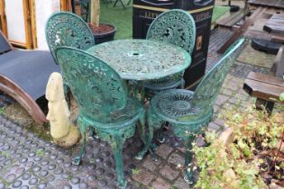 Green Painted aluminium pierced garden table and 4 chairs