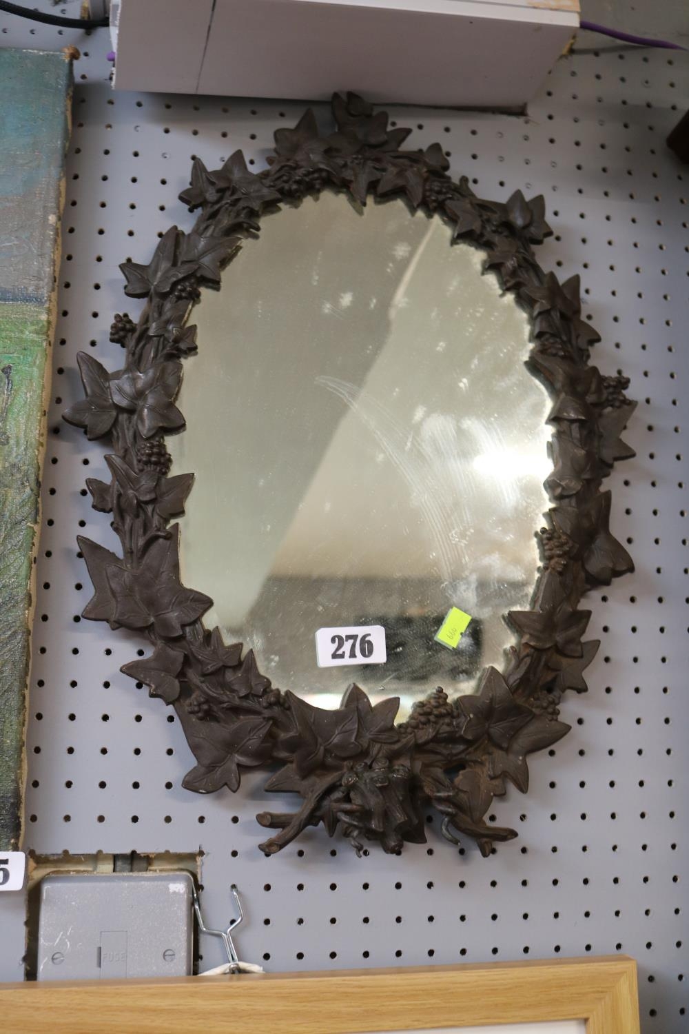 Interesting Cast Iron foliate wall mirror in the style of Coalbrookdale