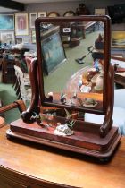 Victorian Mahogany Swing mirror on curved supports