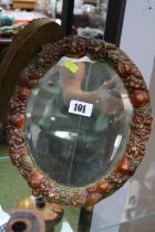 Early 20thC Oval Barbola mirror with bevel edge