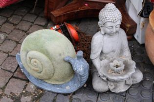 Concrete Buddha and a Model of a Snail