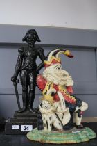 Cast iron door stop depicting Nelson and a Cast iron painted figure of Punch seated