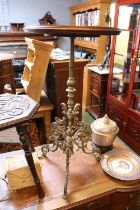 Early 20thC Ornate Brass based table with revolving circular top