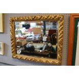 Ornate Gesso framed mirror with bevel edge