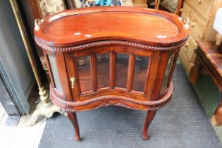 20thC Kidney Shaped Vitrine with integral Butlers Tray over Cabriole legs