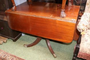 19thC Mahogany table with single drawer and brass drop handles, Splayed brass caster feet