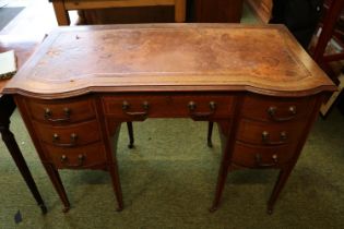 Edwardian Ladies Inlaid writing desk with Leather top and seven drawers supported on tapering legs