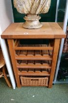 Light Oak Wine stand of heavy construction with single drawer and cane basket to base