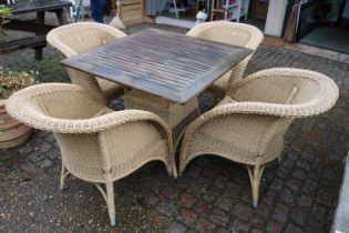 Square Wooden slatted topped Garden table with wicker base and a set of 4 matching Elbow chairs