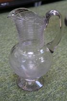 Late Georgian Facetted hand blown ewer with ribbed top over baluster base and applied sloped base