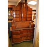 Large Walnut Serpentine fronted Bureau, the top comprises of 10 Drawers and Hinged cupboard door,